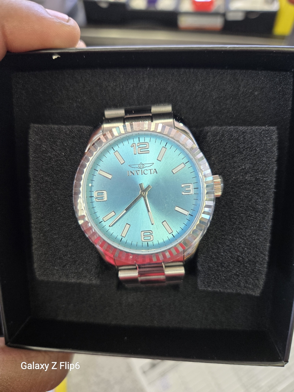 Invicta Men’s Silver Watch with Turquoise Dial
